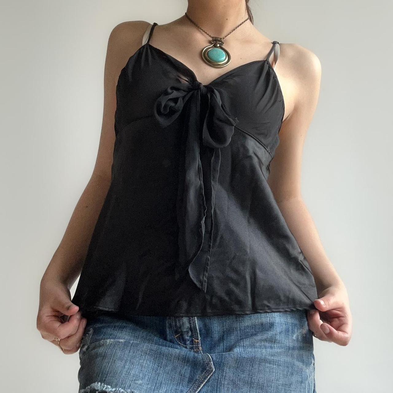 black sheer top with a tie up bow
